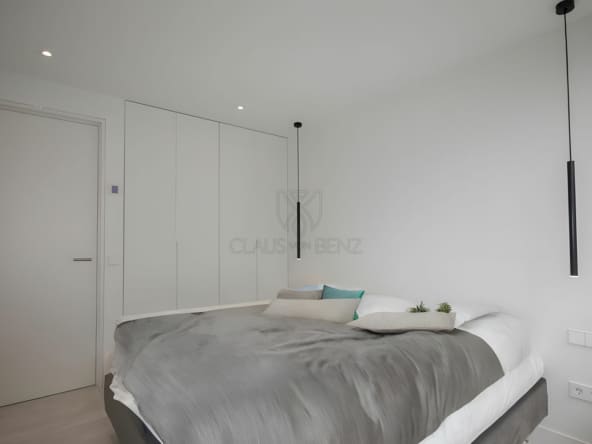 luxury penthouse sea view bedroom with built-in wardrobe