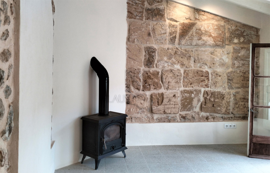 mancor de la vall beautiful renovated mallorcan village house room with fireplace2