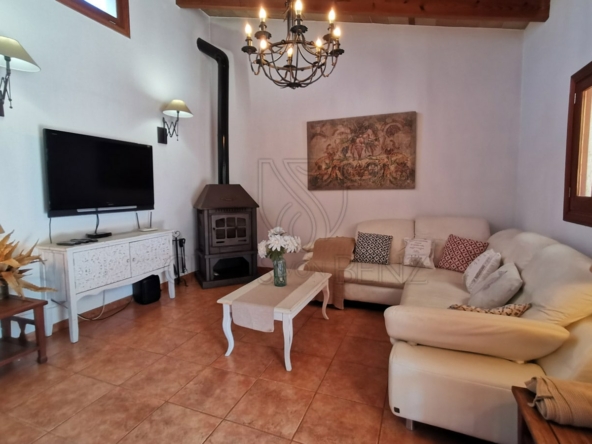 porreres rural property with vacation rental license living room with fireplace