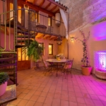 llucmajor elegant townhouse with wine cellar terrace garden furniture min